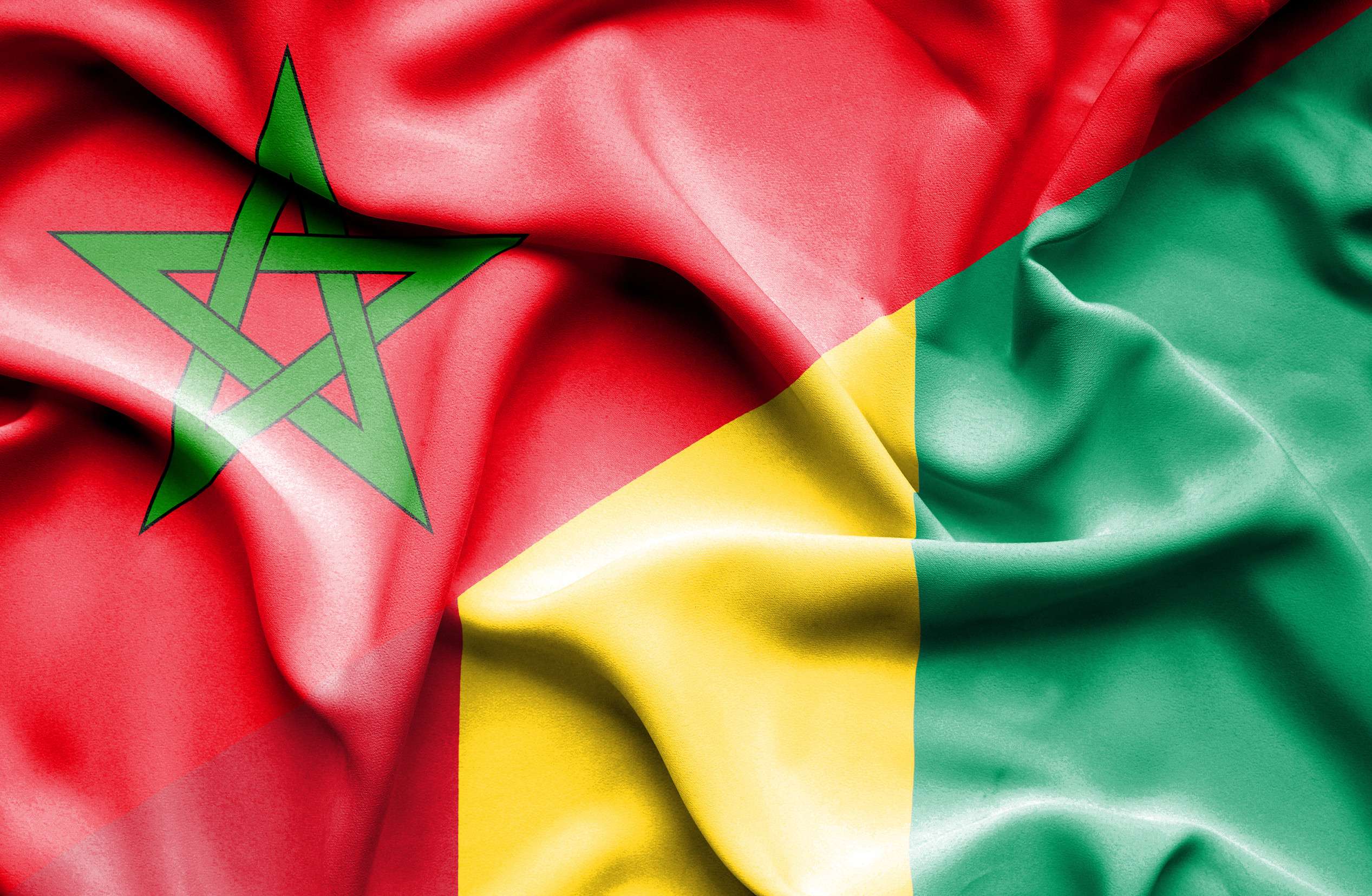 Morocco And Guinea Bissau Flags Together Morocco And Guinea Bissau Flags Together